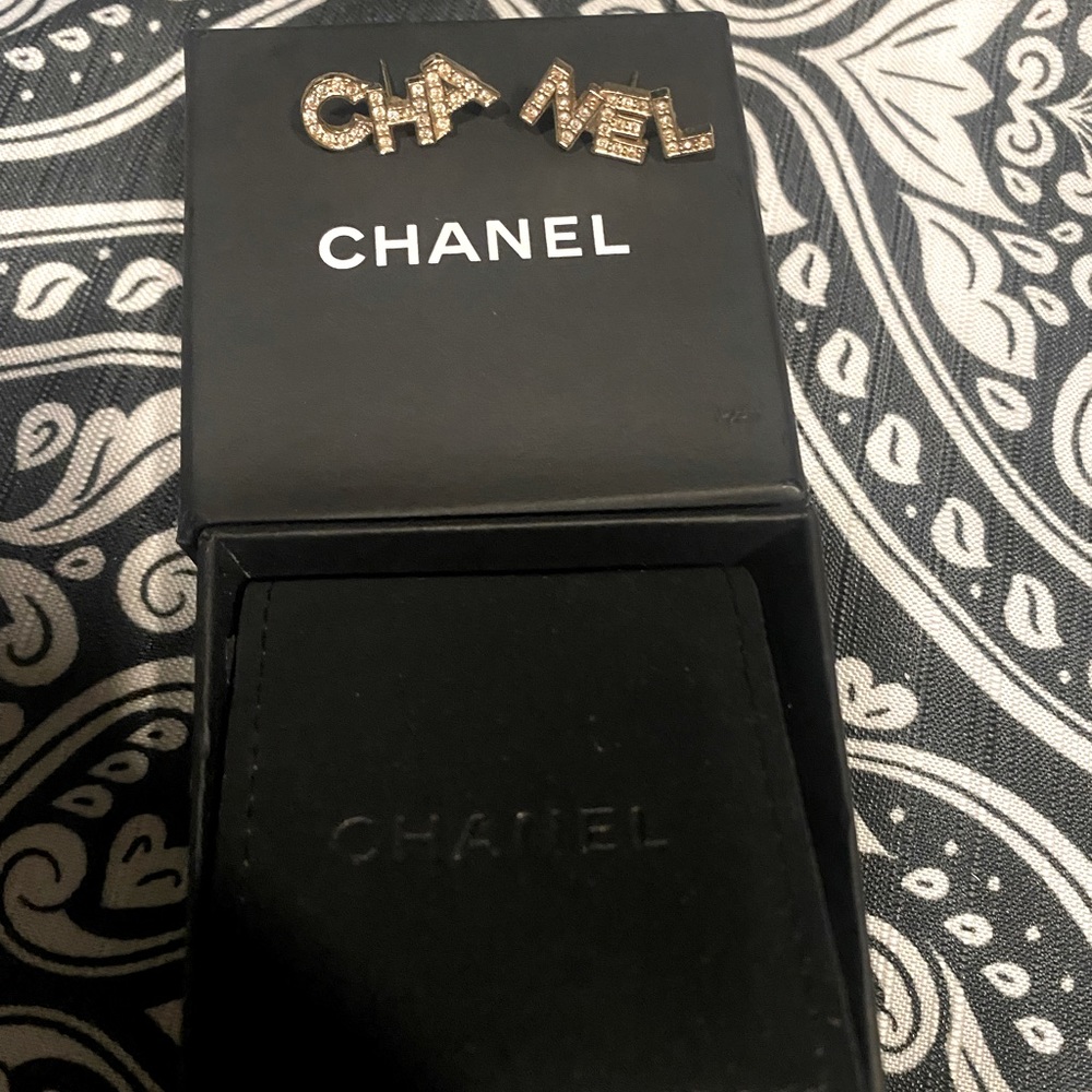100% Authentic Chanel Crystal and Metal signature letter stud earrings